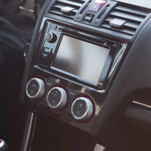 car dashboard and steering wheel interior close-up
