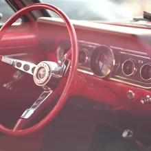 car interior with steering wheel odometer and dashboard