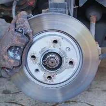 brake disc and caliper brake inspection close-up