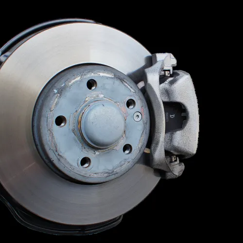 brake disc and caliper brake system close-up automotive