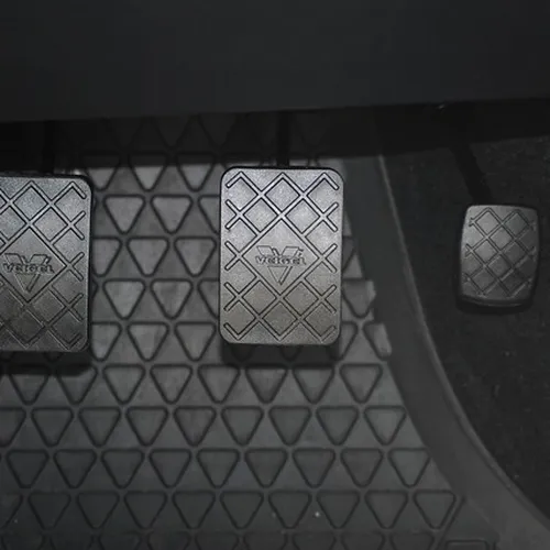 car accelerator brake and clutch pedals close-up