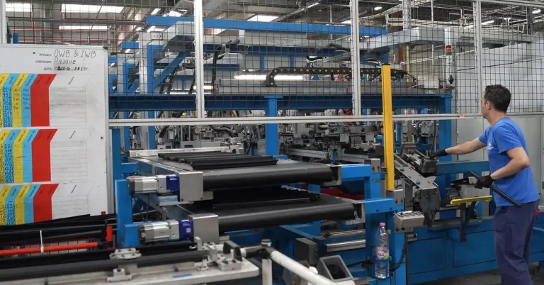 car assembly line at a Ford manufacturing plant