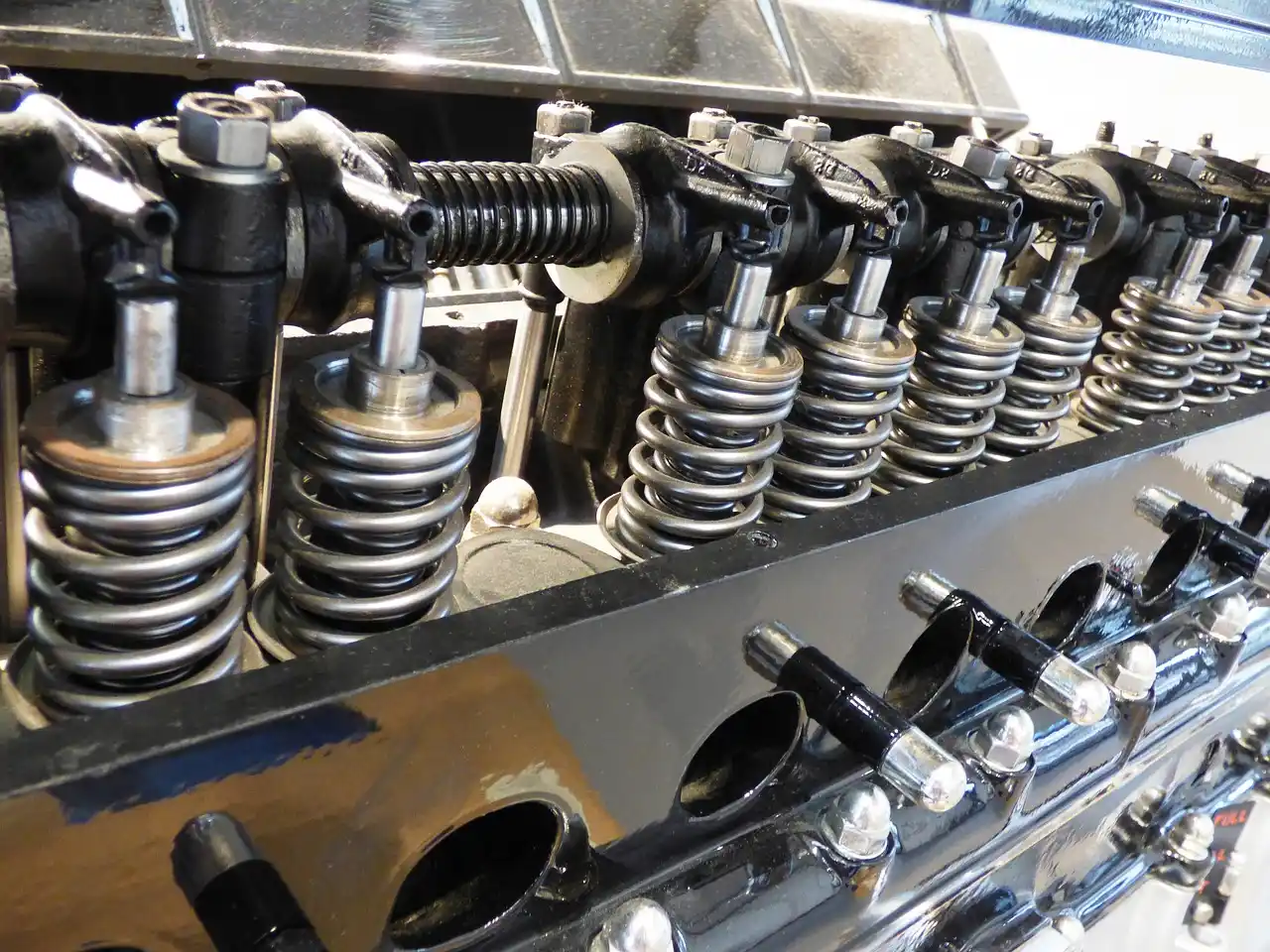 How can I identify engine parts under the hood?
