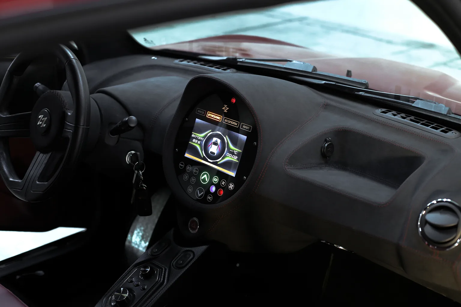 Chevy Bolt EUV rear seat close-up showing legroom and a child seat