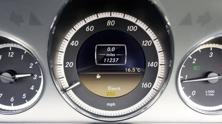 Honda Civic driver using steering wheel controls to reset the maintenance minder after service