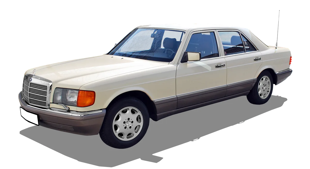 Uber driver comparing a compact hybrid sedan, midsize sedan, and small SUV at a curb
